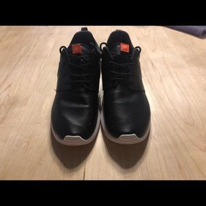 Nike black and white leather shoes